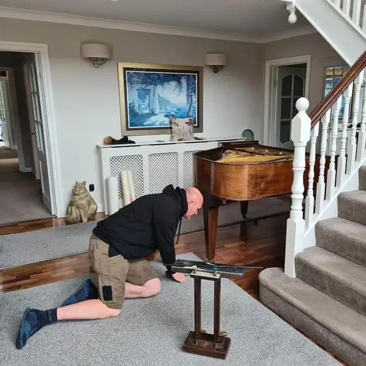Brendans helping with a piano move