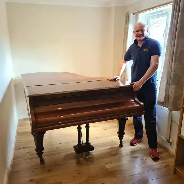 Brendans moving a grand piano